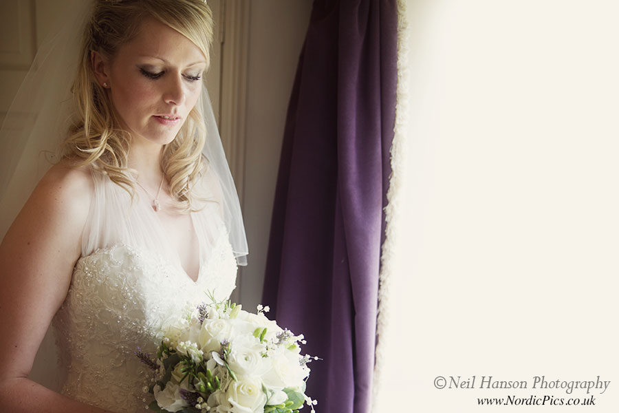 Bride on her Wedding day before the ceremony at The Bay Tree Hotel in Burford