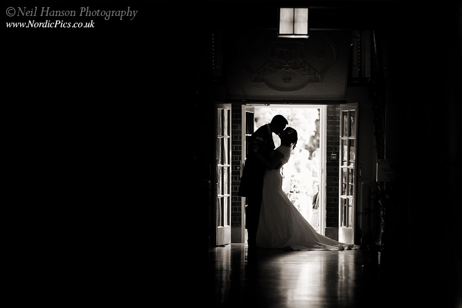 Creative Bride and Groom portraits by Neil Hanson photography at a St Hughs College Wedding