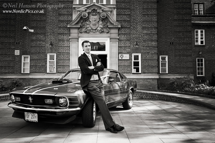 Groom with his Mustang Wedding car at St Hughs College Oxford
