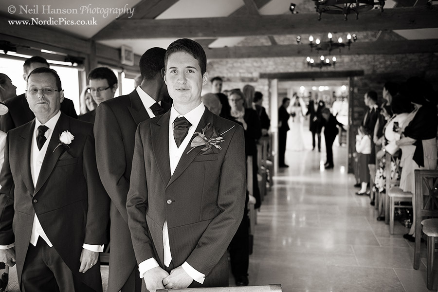 Groom waiting for his bride to arrive at a Caswell House Wedding by Neil Hanson Photography
