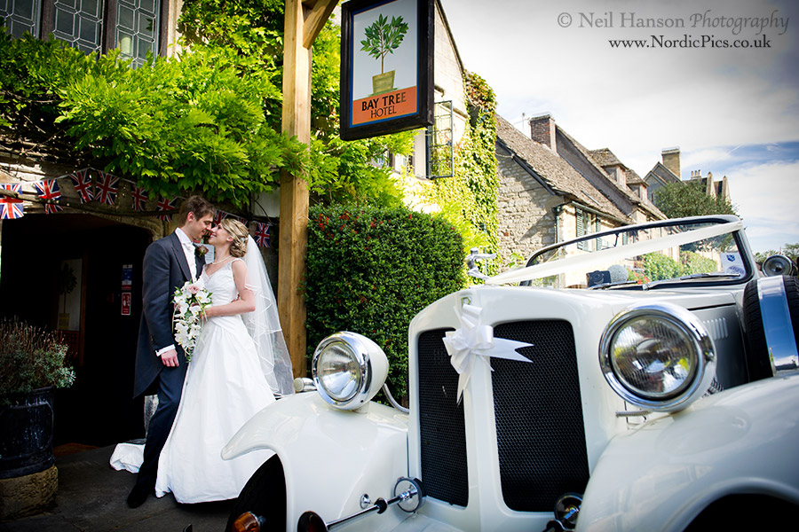 Bride & groom arriving for their September Wedding reception at the Bay Tree Hotel Burford
