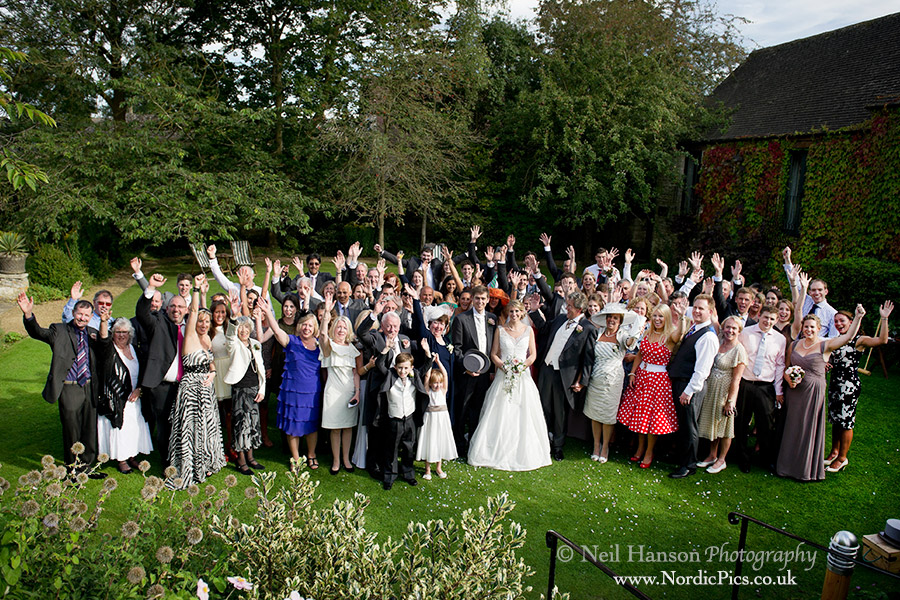 A whole Wedding guest group shot at The Bay Tree Hotel in Burford Oxfordshire