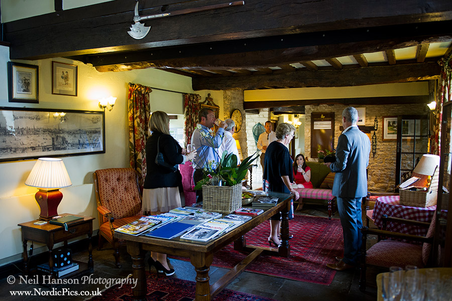 Guests enjoying drinks at The Old Swan and Minster Mill Wedding
