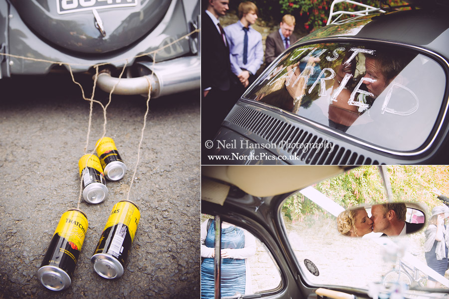 Decorating the Wedding Cars at a Devon Wedding in Saunton Sands by Neil Hanson Photography