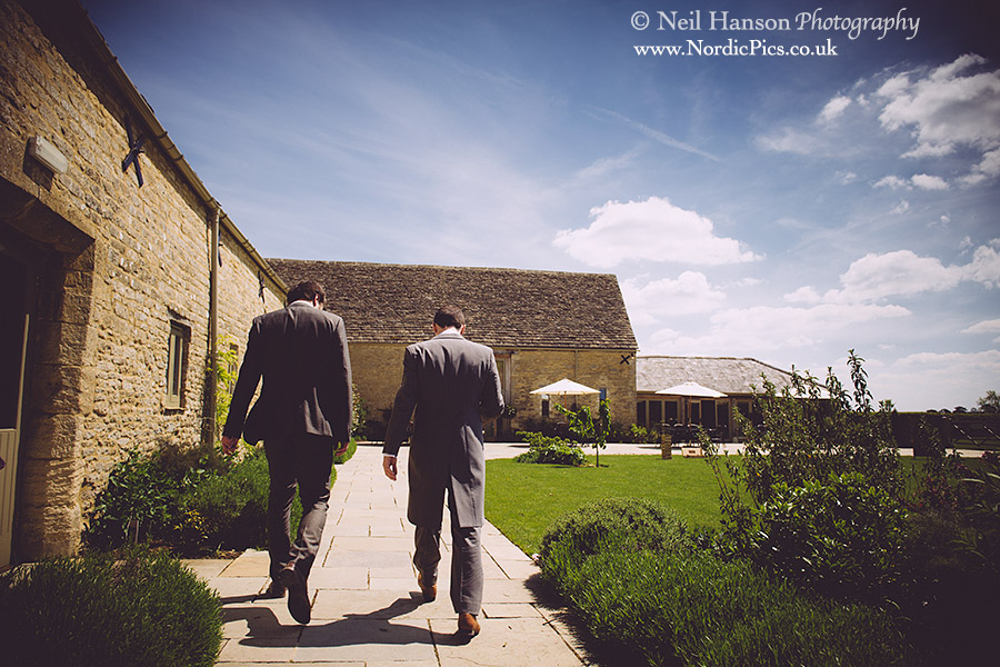 Groom & Best Man walking to Caswell House Wedding in the Cotswolds