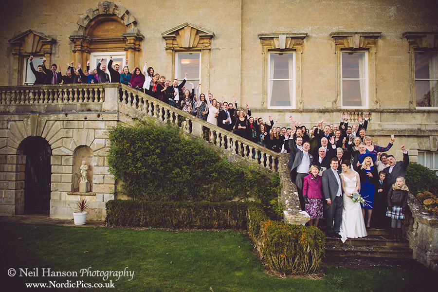 Large group shot of a Winter Wedding at Kirtlington Park by neil hanson photography