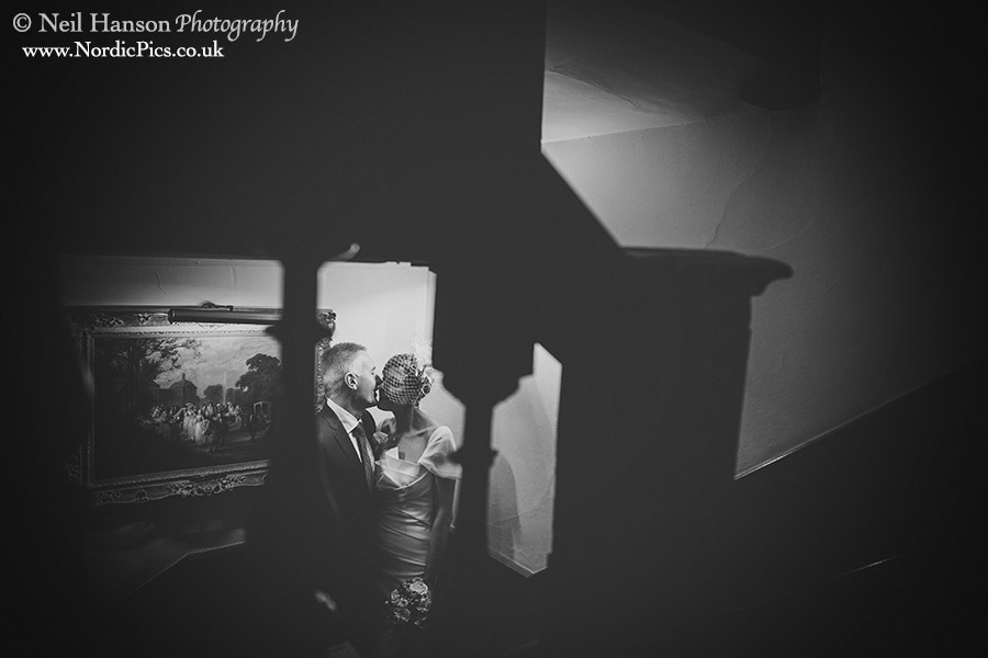 Black and white bride and groom portraits at a Buckland Manor Wedding