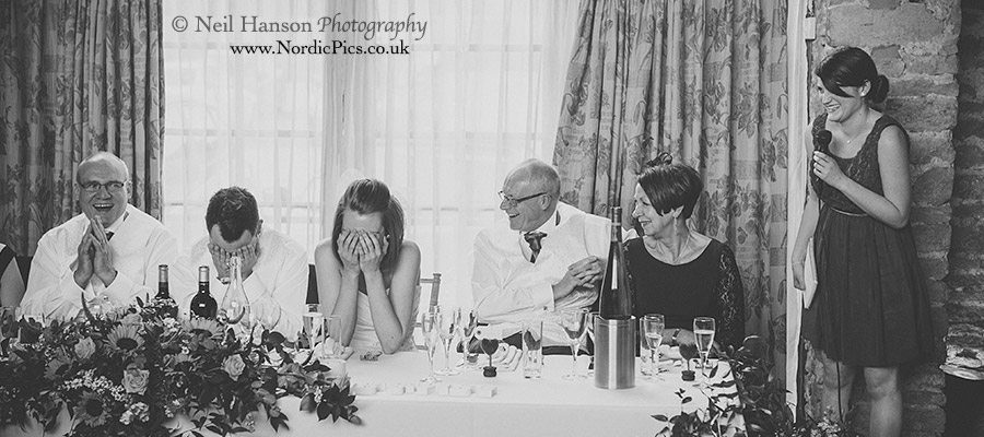 Fun moments during the speeches at Faye & Richard's Great Barn Aynho Wedding
