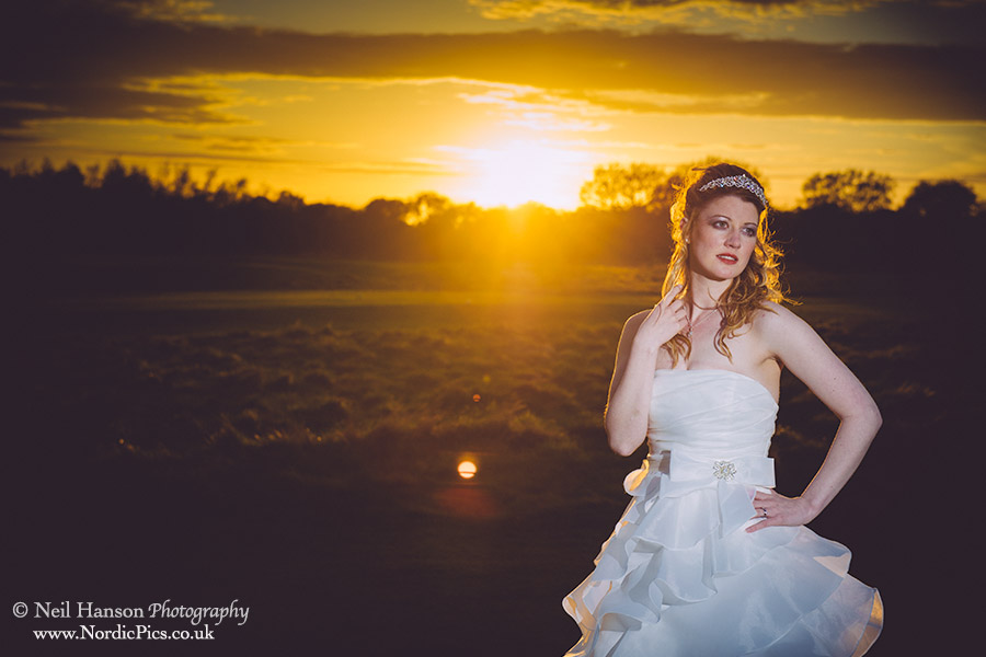 Katy on her wedding day at sunset at Rye Hill Golf Club