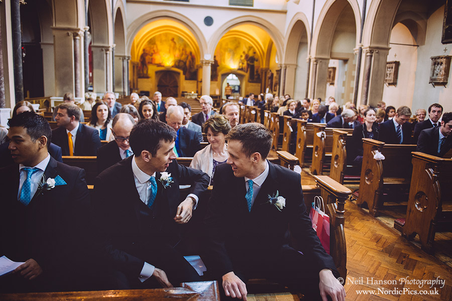 Grooms awaits brides entrance at a Wedding at The Oxford Oratory