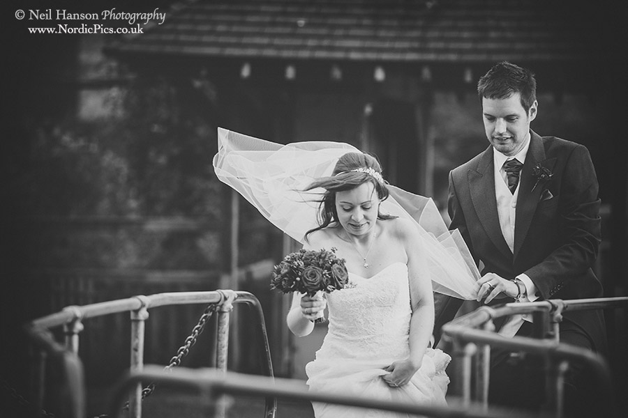 Bride and groom at Iffley Lock on their Wedding day