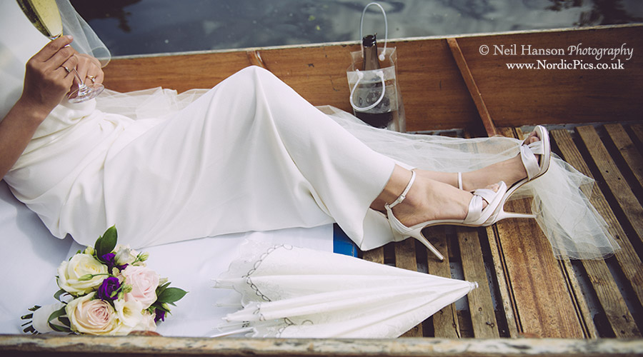 Bride and Groom punting on their Wedding day at The Cherwell Boathouse Oxford