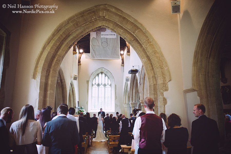 Wedding ceremony at St Marys Church Cogges
