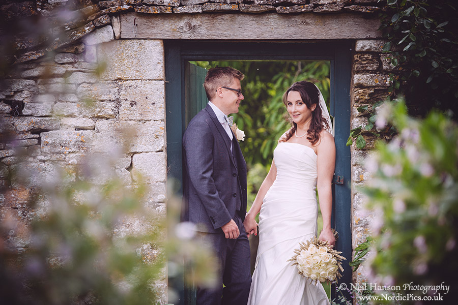 Bride and Groom in the gardens at Cogges farm Museum
