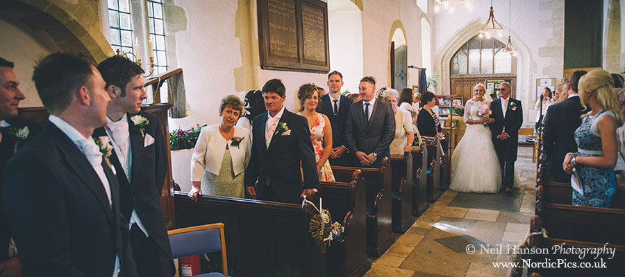 Bride & Father walk down the aisle at Fulbrook Church