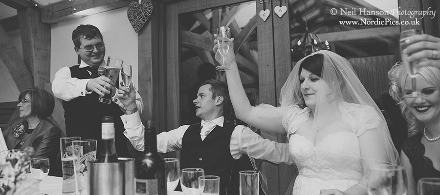 Toast to the bride & groom on their wedding at Cripps Barn
