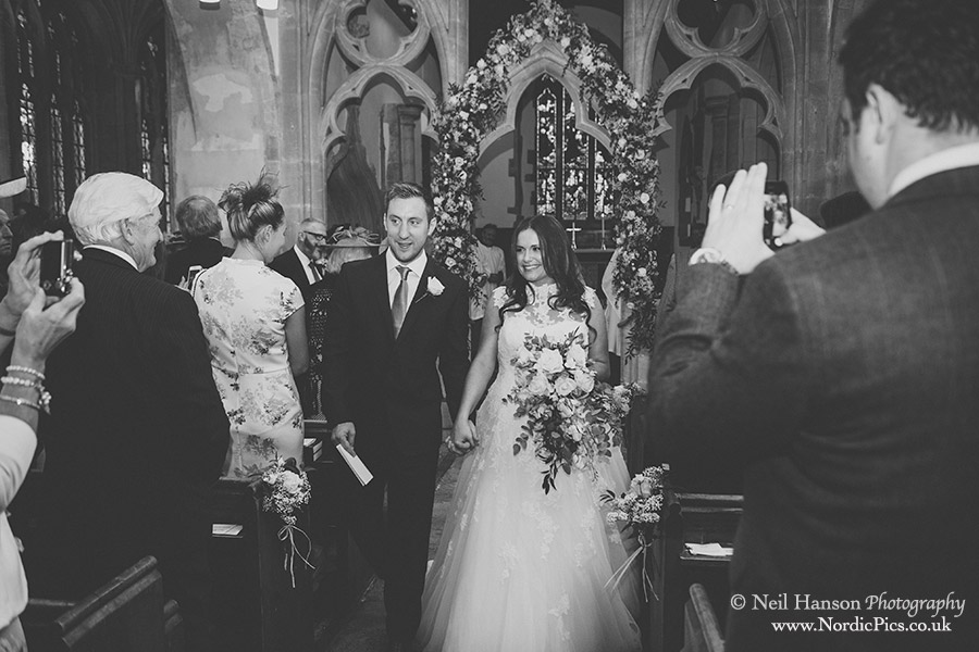 Bride & Groom exit after their Wedding ceremony at North leigh church