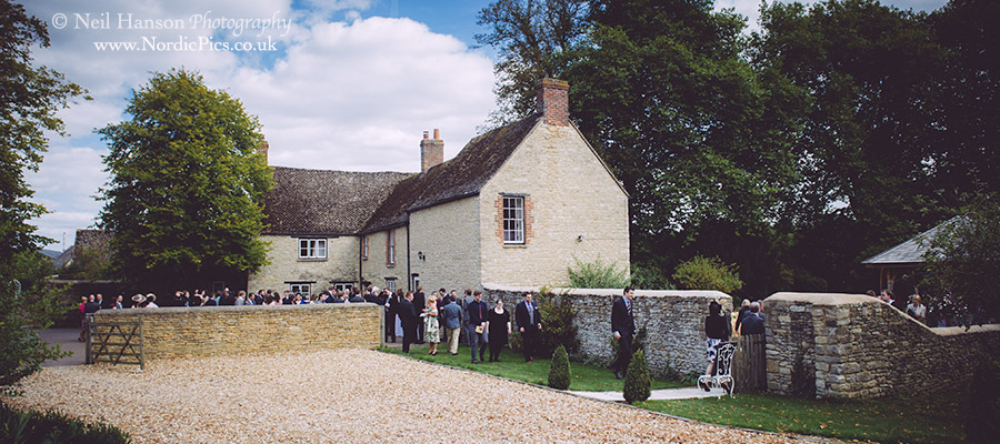 Wedding guests arrive at Worton Park Old Rectory for a Wedding ceremony