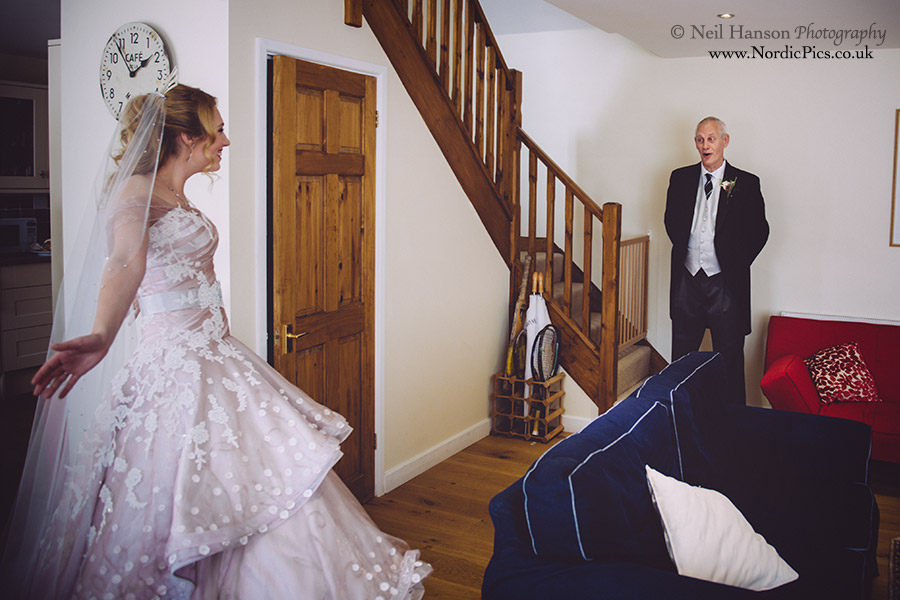 Farther of the Bride sees his daughter for the first time on her Wedding day