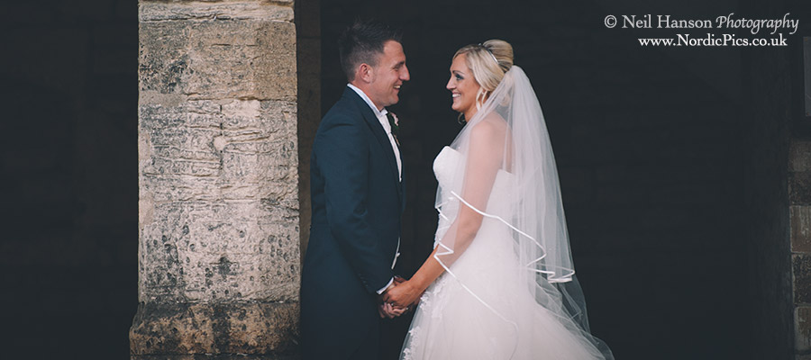 Bride & groom on their Wedding day in Burford by Neil Hanson Photography