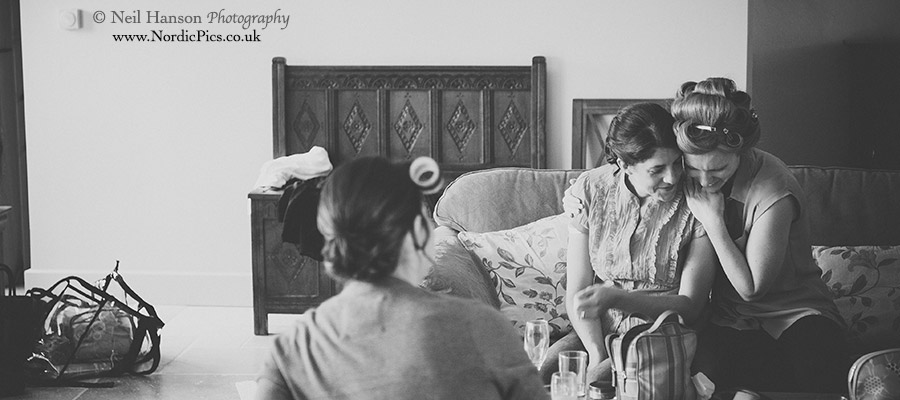 Emotional moment between bride & bridesmaid at a Caswell House Wedding