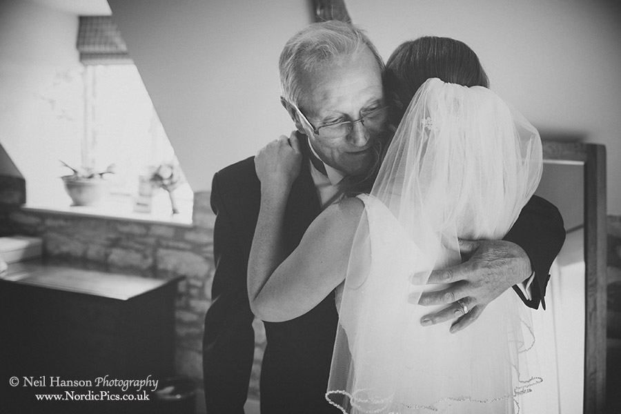 Father greets his daughter after seeing her in the dress for the first time