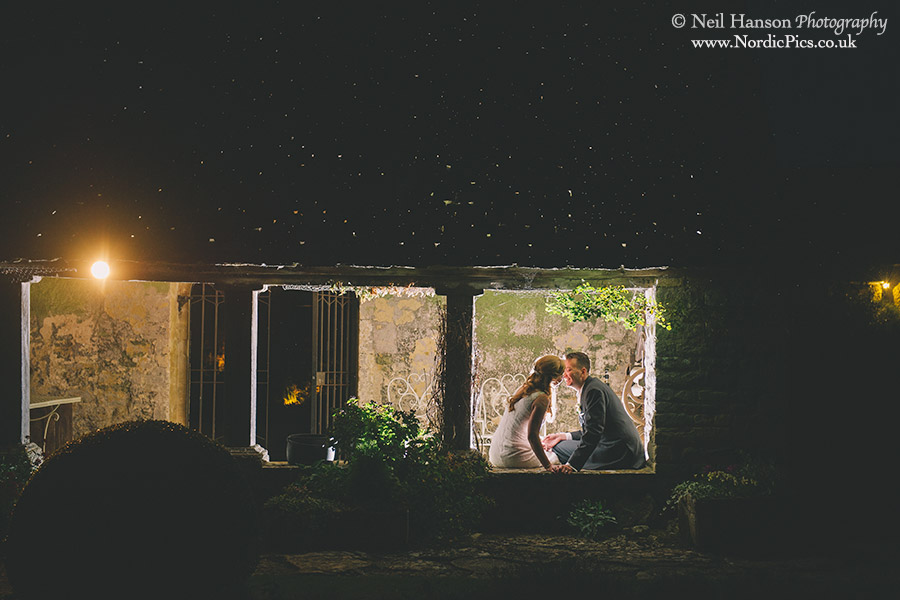 Creative night portraits of the bride & groom at a Caswell House wedding