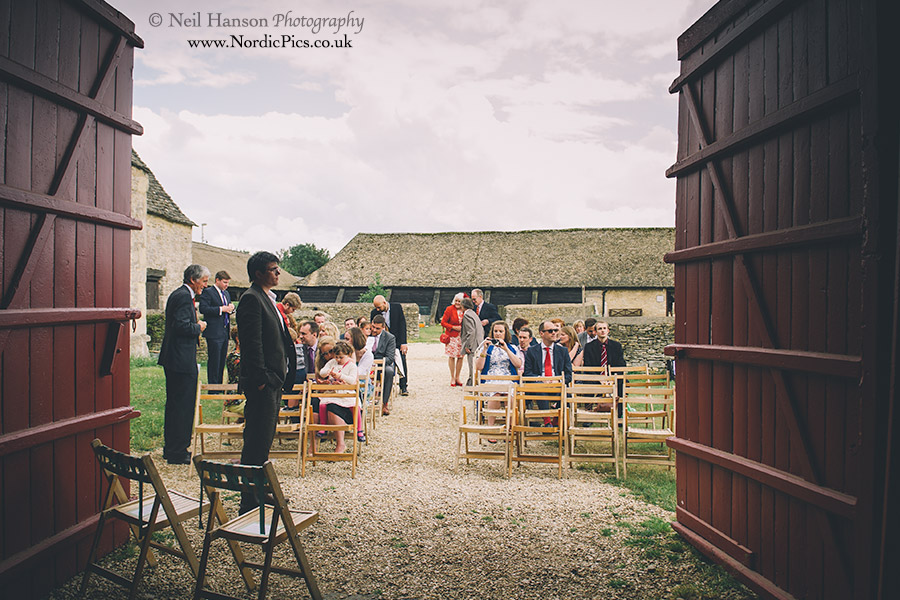Groom waiting for his bride to arrive at Cogges Farm Wedding