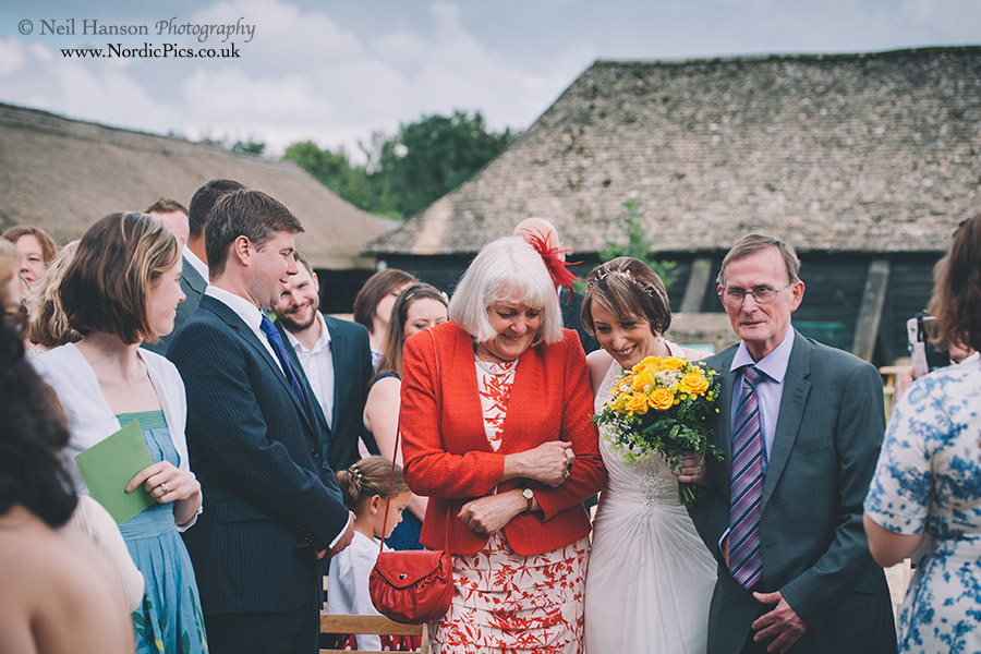 Excited bride arriving at Cogges farm Museum Wedding