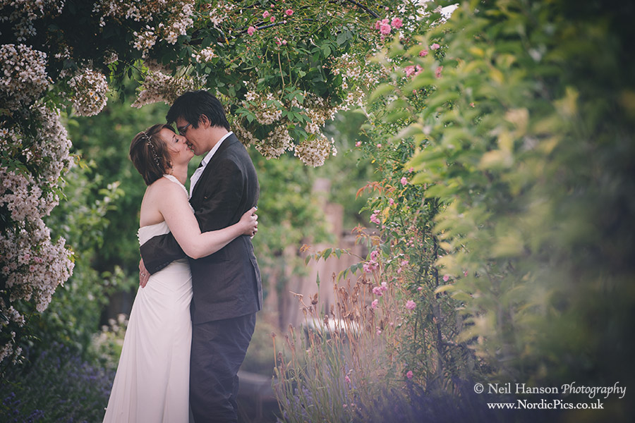 Bride & groom kissing at Cogges Farm Wedding