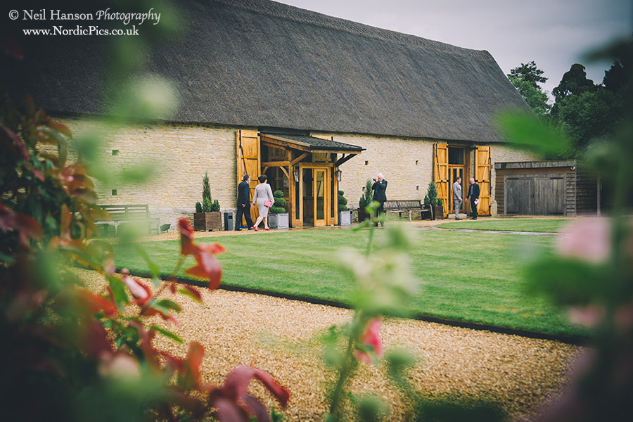 Guests arriving for a wedding at The Tythe Barn Launton