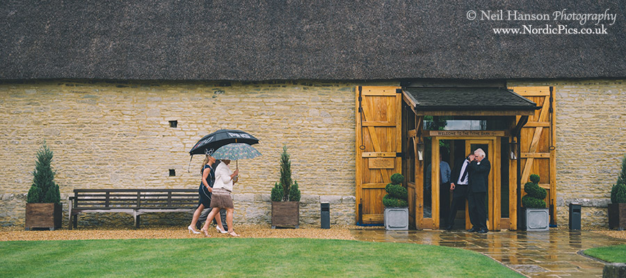 Guests arriving in the rain