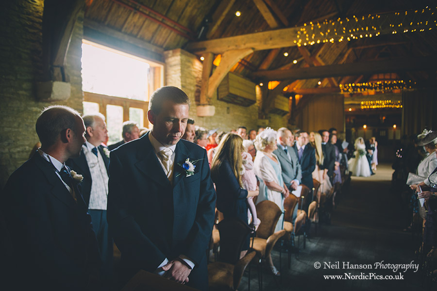 Groom waits for his bride to arrive at The Tythe Barn Launton