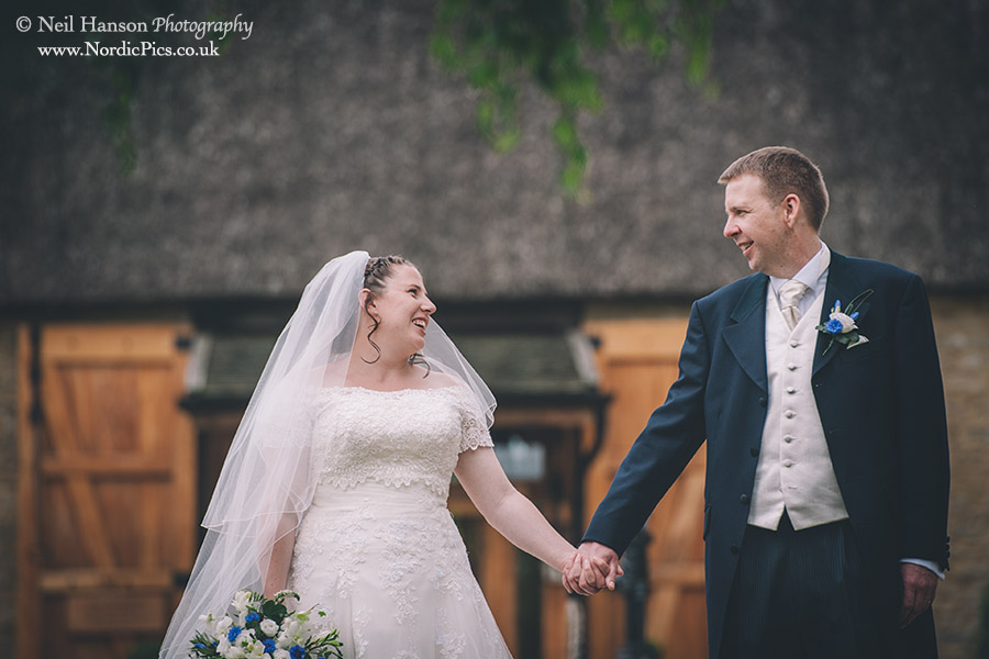 Bride & groom on their Wedding day at The Tythe Barn Oxfordshire