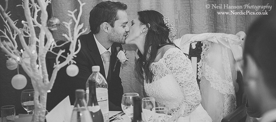 Bride & groom kiss at a Wedding at Ufton Court
