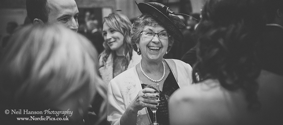 Laughing guests at the drinks reception
