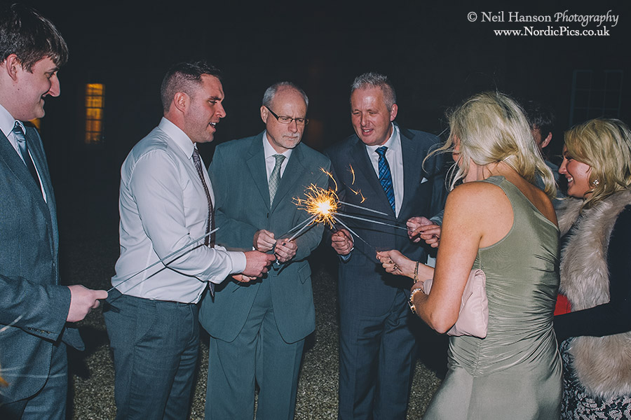 Guets lighting sparklers at Blenheim Palace Wedding