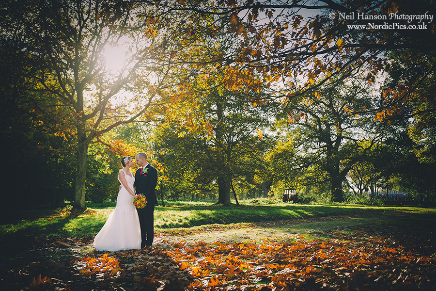 Bride and Groom in the grounds of Milton Hill House at their Autumn Wedding