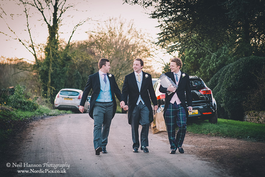 Groom and Groomsmen arrive at Little Barrington Church Oxfordshire for a Wedding