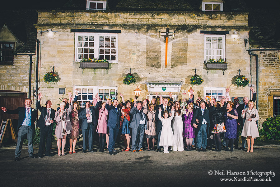 Large group shot outside The Angel Pub in Burford