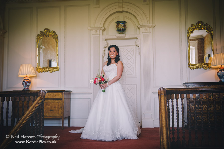 Bride on the stairs at Ardington House