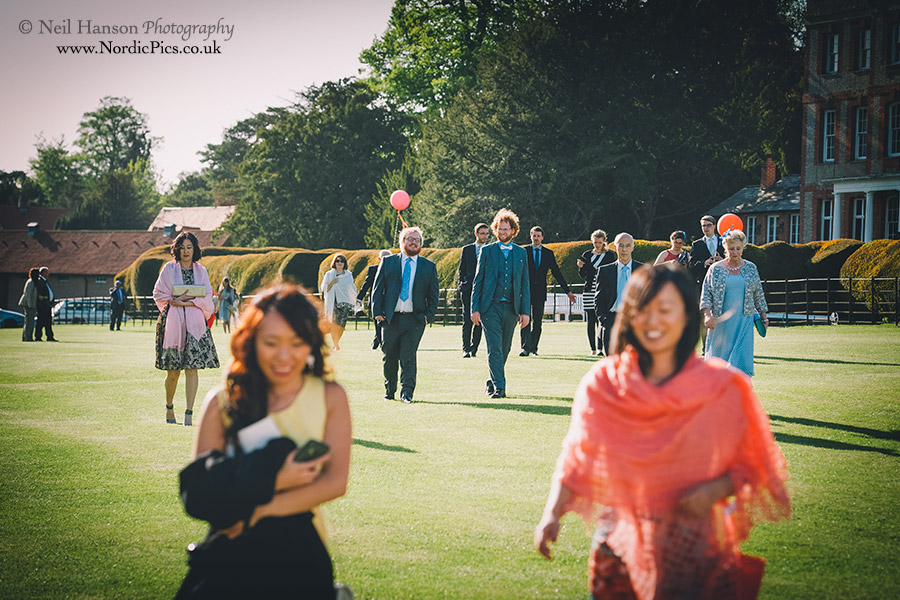 Wedding guests walking to the marquee for their Wedding breakfast
