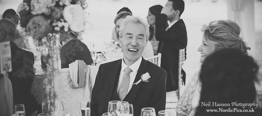 Father of the Bride laughing during the wedding breakfast