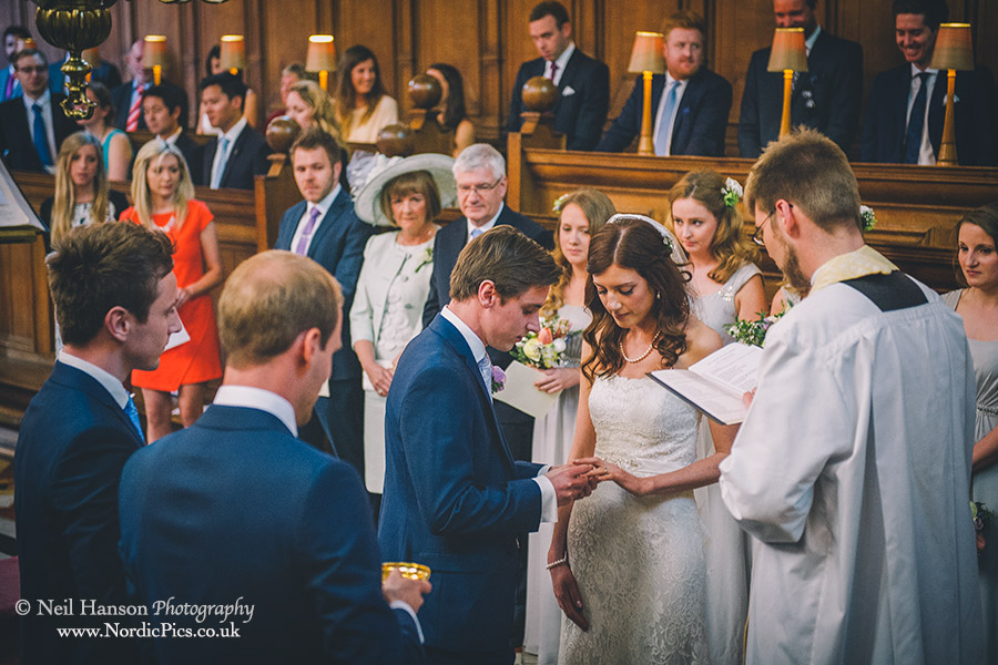 Exchanging rings at a Brasenose College Wedding Ceremony