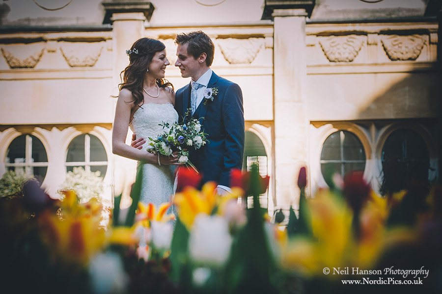 Bride and Groom in the Tulips at Brasenose College Wedding