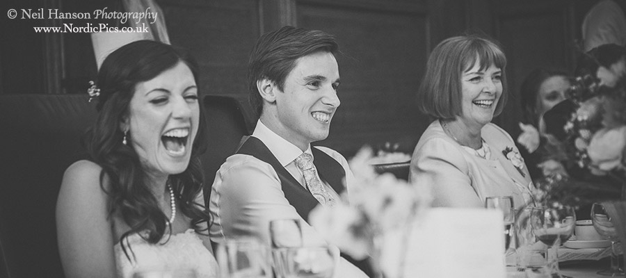 Grooms reactions to a joke during the speeches