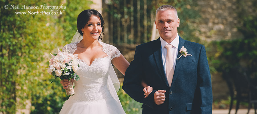 Bride and her Father walking down the isle at a Caswell House Wedding