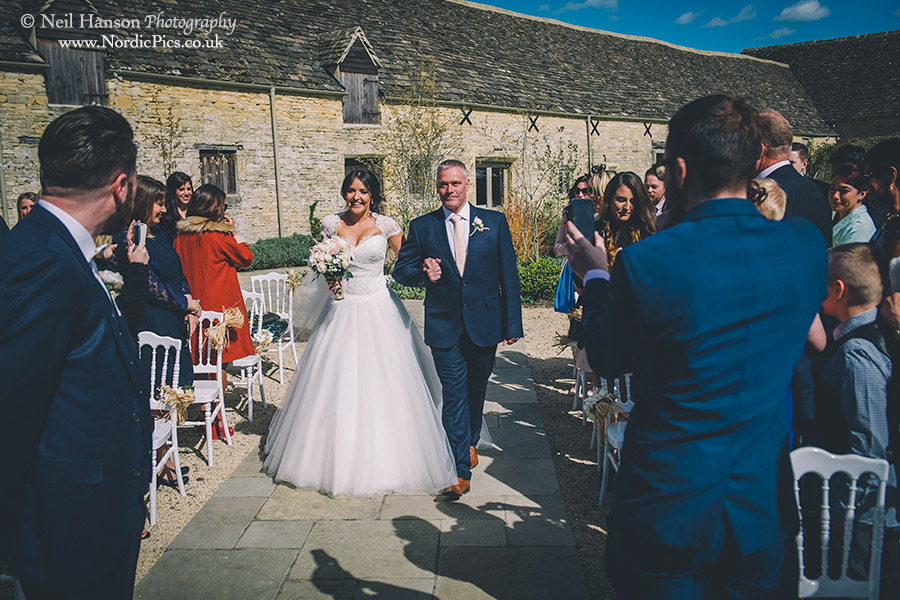 Groom sees his bride for the first time at an outdoor Wedding Ceremony at Caswell House