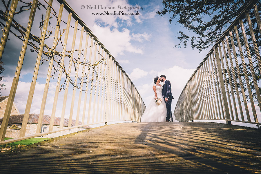 Bride and Groom on the Caswell House bridge