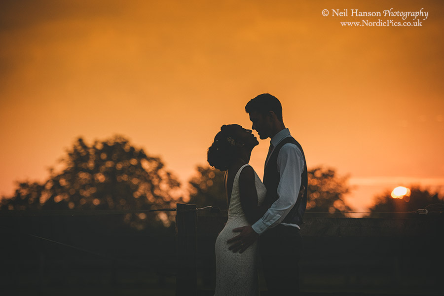 Bride and Groom enjoying a Worton Hall Wedding sunset moment